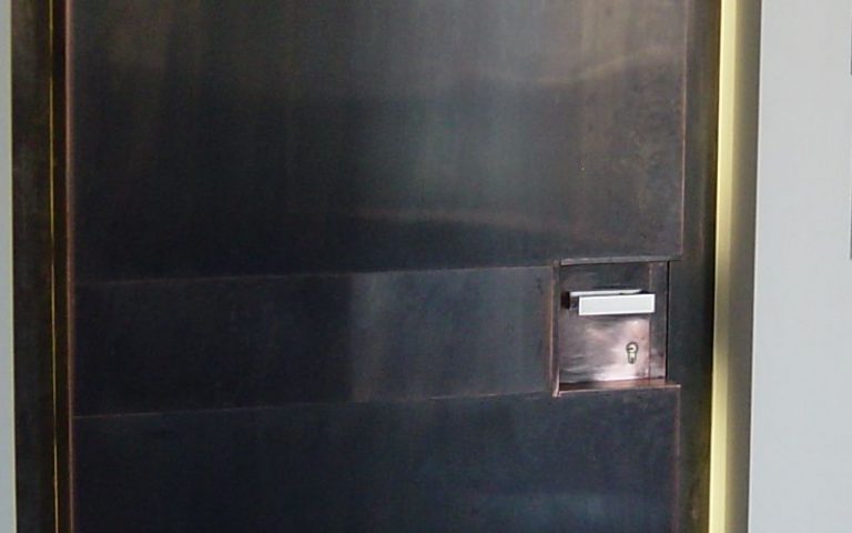 copper covering on door